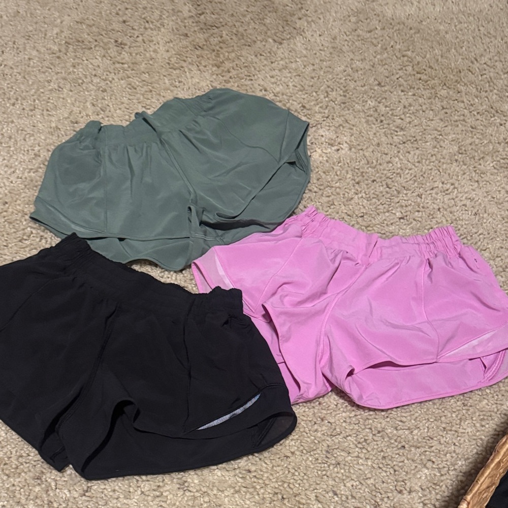 lululemon hotty hot shorts all size 6 and 2.5 inch- Black, Pink, Green